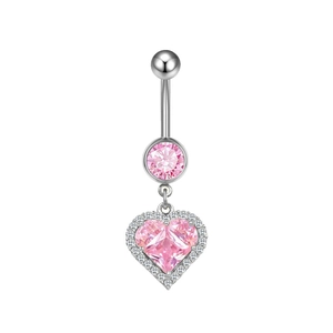 Macro view of silver belly ring with round pink gem and halo-set heart-shaped crystal