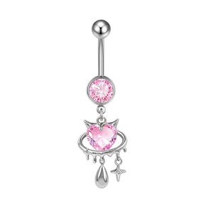 Detail of pink heart zircon belly ring with silver devil horn frame and star charm