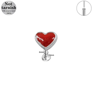 Red heart labret stud made of 316L surgical steel with silver metallic edging detail