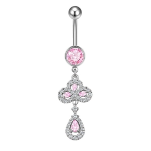 Detail of pink heart moon navel ring with crystal accents and teardrop dangle charms
