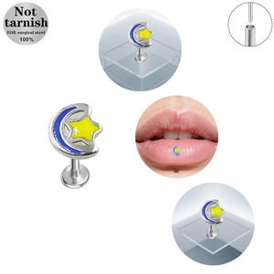 Macro detail of blue moon and star labret stud made of anti-allergy 316L surgical steel