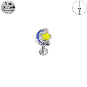 Macro detail of moon and star piercing jewelry made of 316L medical grade steel