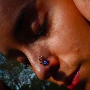 Evil eye non-piercing nose cuff jewelry with blue bead for bohemian style look