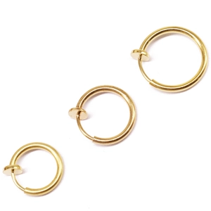 Three golden copper spring clip rings for non-pierced ears and nose, minimalist jewelry style