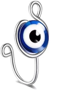 Macro shot of silver evil eye nose clip featuring a blue bead and U-shape design