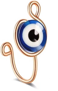 Close-up of rose gold evil eye nose cuff clip with vibrant blue and white enamel detail