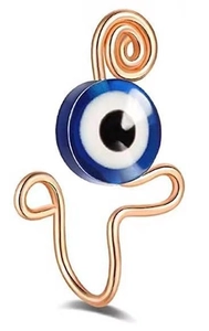 Macro shot of rose gold evil eye non-piercing nose ring with blue bead detail