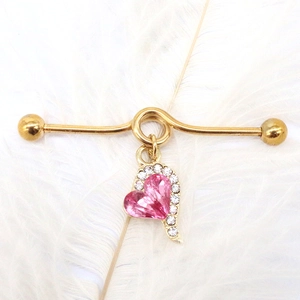 Industrial barbell earring in gold finish with pink heart crystal and rhinestones