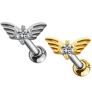 Dettaglio degli orecchini a forma di ala in oro e argento con brillanti zirconi cubici