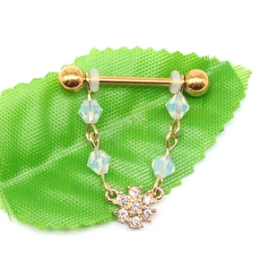 Gold plated stainless steel nipple ring with flower charm and blue bead chain