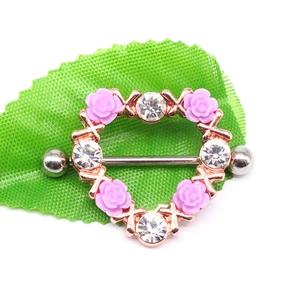 Rose gold heart nipple shield ring with pink resin flowers and clear cubic zirconia stones