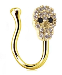 Golden U-shaped skull nose ring clip with micro-set white crystals and black gem eyes