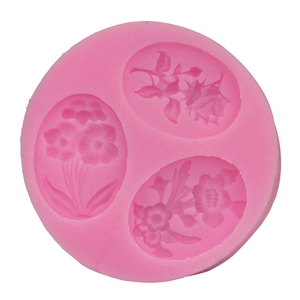 Pink silicone flower mold for DIY cake decorating and soap making with 3 floral cavities