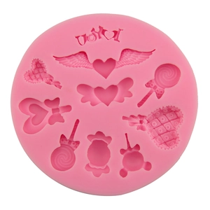 Pink silicone heart and wing lollipop mold for fondant and chocolate baking DIY