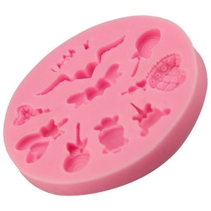 Pink silicone heart and wing lollipop mold for DIY baking and chocolate making