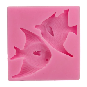 Pink silicone mold featuring two tropical fish shapes for DIY fondant and baking