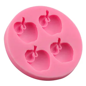 Pink silicone mold with 4 apple-shaped cavities for DIY cake baking and crafts