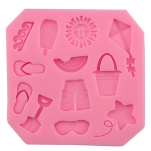 Rosa Silikonform mit Sommer-Strandmotiven wie Sonnenbrille und Drachen zum Backen und Basteln