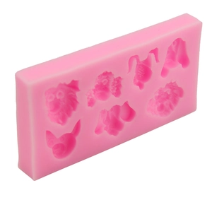Detailed pink silicone mold featuring multiple dog and cat breed shapes for baking and DIY