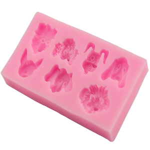 Detail of pink 6-cavity dog head silicone mold for soap and fondant DIY crafts