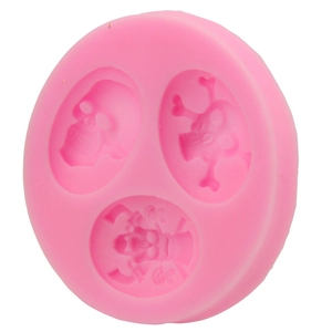 Pink silicone cake mold with three unique skull patterns for DIY Halloween baking