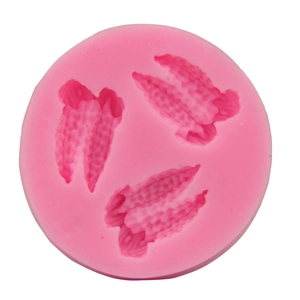 Pink silicone corn shape cake mold with three cavities for DIY baking and fondant