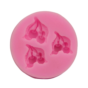 Pink silicone mold featuring three detailed cherry patterns for cake decoration and DIY crafts