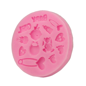 Pink silicone baby girl fondant mold for cake decorating featuring baby head and bottle shapes
