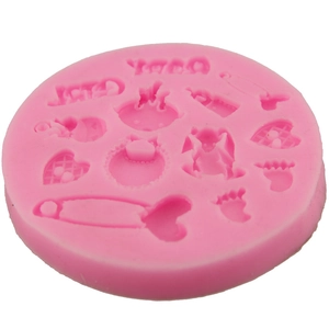 Pink silicone fondant mold featuring baby footprints, safety pins, and hearts for DIY baking