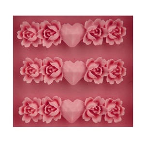 Pink silicone mold featuring rose and heart designs for baking and DIY crafts