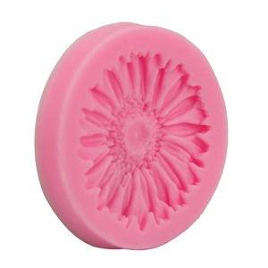 Detailed macro view of a pink sunflower silicone mold showing intricate petal textures
