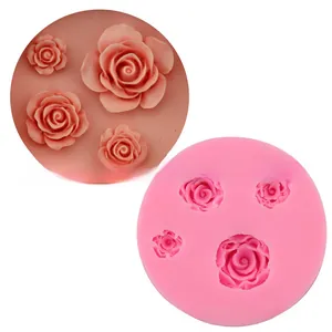 Detail of pink silicone mold featuring four various rose flower shapes for DIY baking