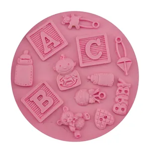 Pink silicone baby themed mold with teddy bear, bottle and pram patterns for DIY cake baking