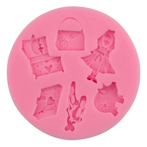 Pink silicone mold with vintage dress, handbag and ballet shoes shapes for DIY cake baking