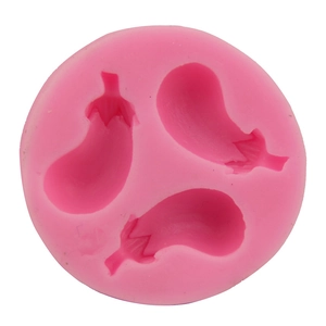 Pink round silicone mold featuring three eggplant shapes for DIY fondant and baking