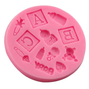 Pink silicone baby themed mold with teddy bear and bottle for DIY fondant cake baking