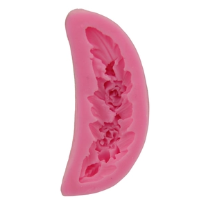 Pink crescent moon silicone mold with detailed rose floral patterns for DIY fondant cake