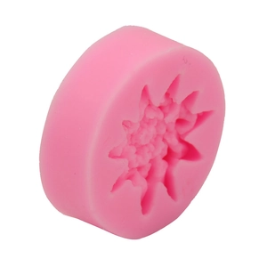 Macro detail of a pink silicone flower mold for handmade soap and baking crafts