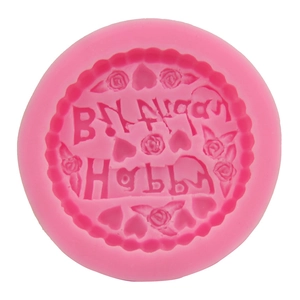 Pink silicone Happy Birthday cake mold with floral and heart relief patterns