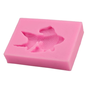 Detailed pink silicone goldfish mold showing intricate scale and fin textures for DIY craft