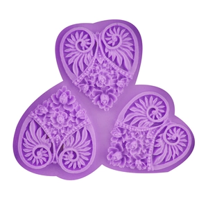 Purple heart-shaped silicone mold with floral rose patterns for fondant and DIY baking