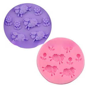 Detail view of silicone mold featuring little lamb and flower patterns for DIY baking