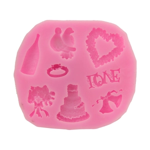 Pink silicone mold featuring wedding heart, love, and cake designs for DIY baking