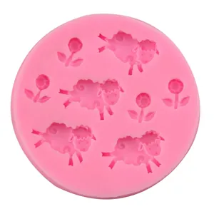Pink silicone mold featuring cute sheep and flower patterns for cake decorating and DIY