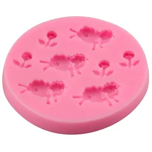 Pink silicone mold featuring cute little sheep and flower patterns for DIY baking