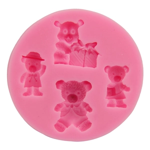 Pink silicone mold with four teddy bear shapes for cake decorating and chocolate baking