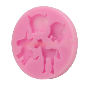 Detail of pink silicone round mold with unicorn and sheep shapes for DIY baking