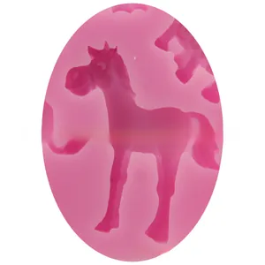 Detail of pink horse-shaped silicone mold for fondant baking and DIY craft making