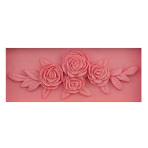 Pink silicone mold featuring relief rose flowers and leaves for DIY cake baking and fondant