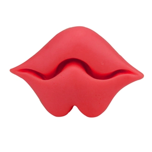 Red silicone lip trainer and face muscle exerciser tool shown on white background